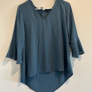 Woman’s blue blouse